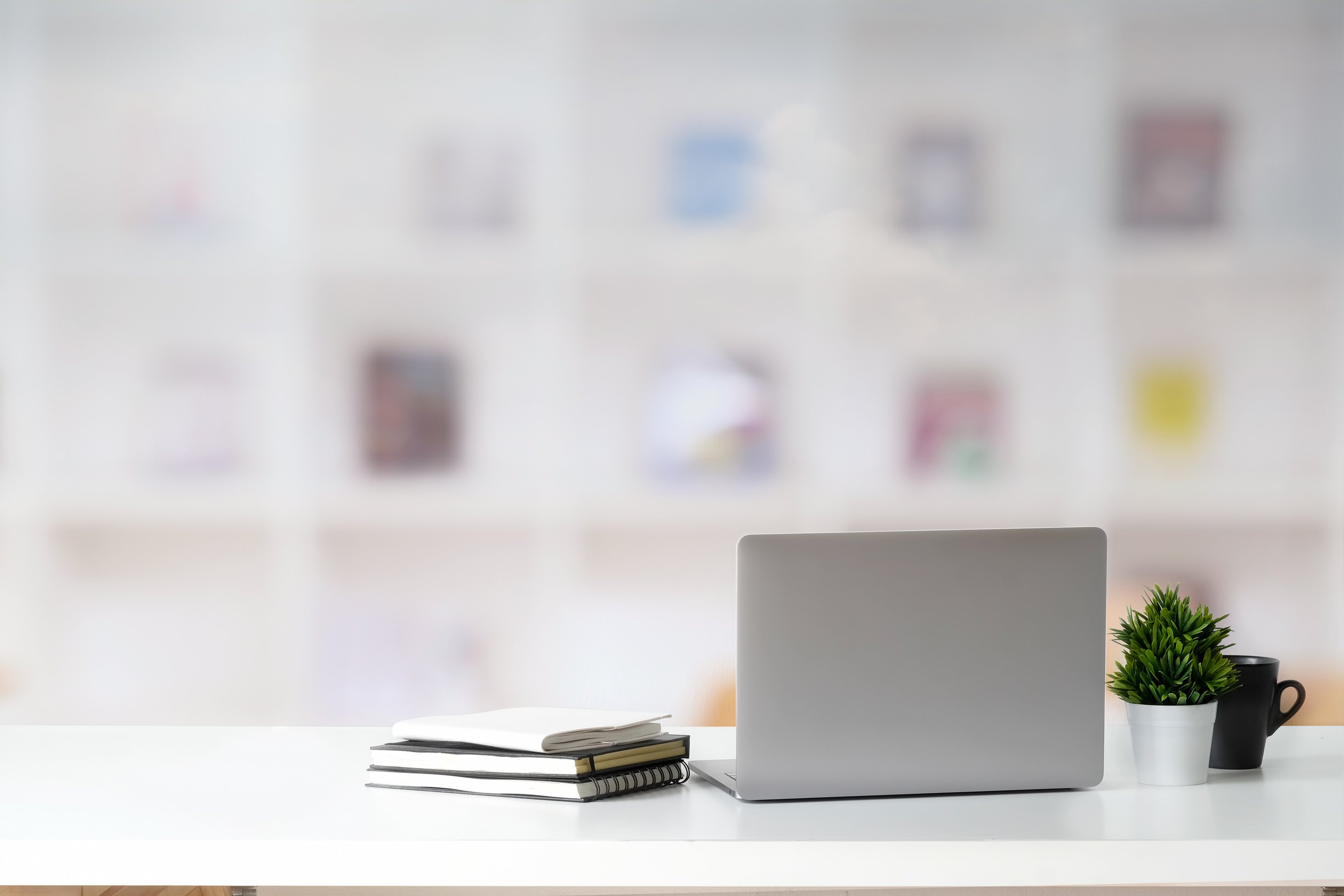 Office desk with laptop.